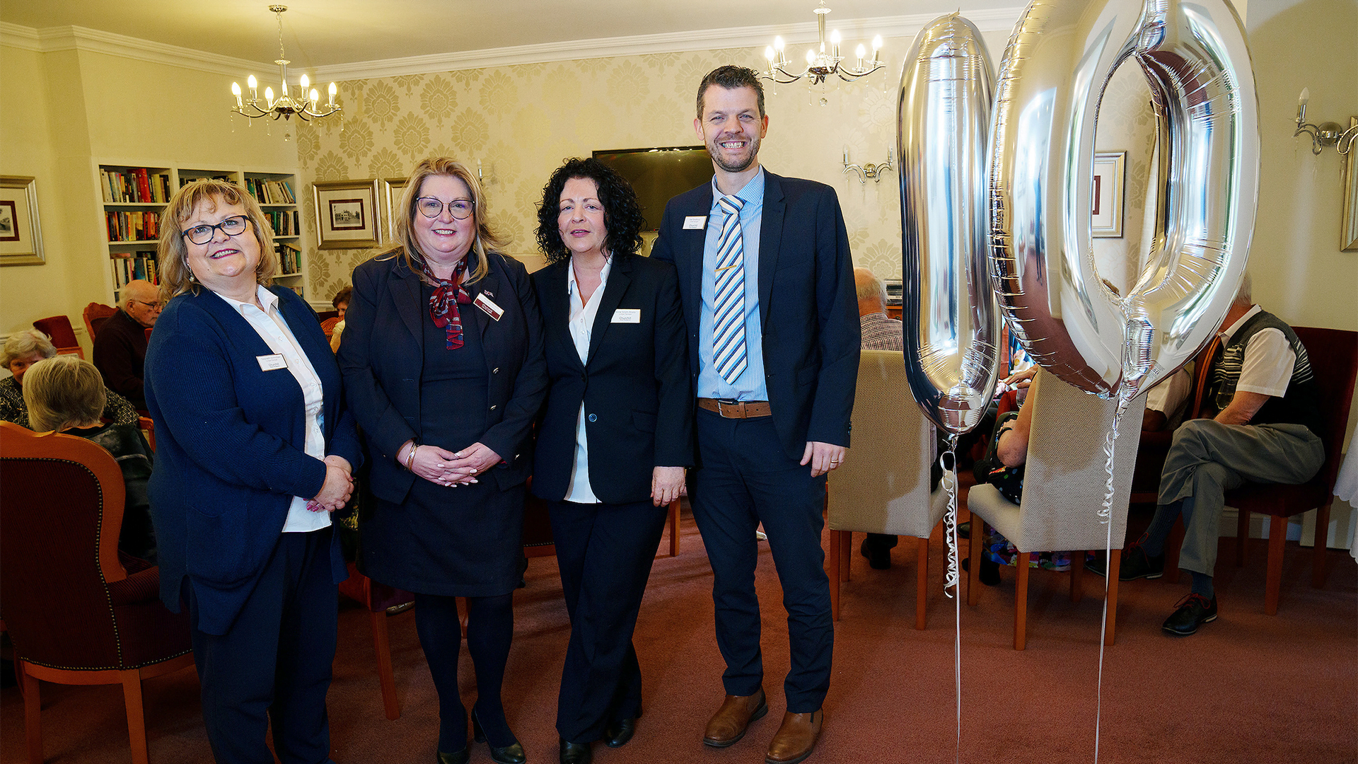 Owners and the Lodge Manager Celebrating 10 years at Brindley Lodge