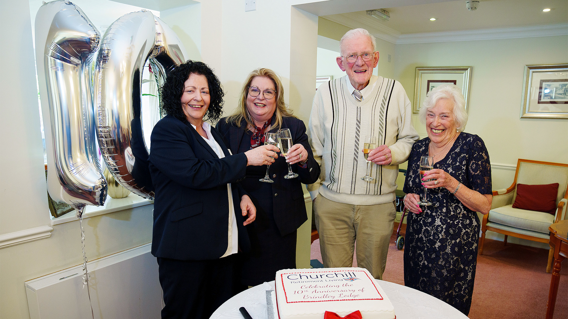 Owners and the Lodge Manager Celebrating 10 years at Brindley Lodge